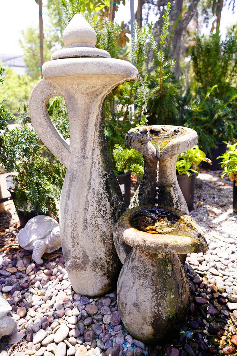 three leveled stone fountain